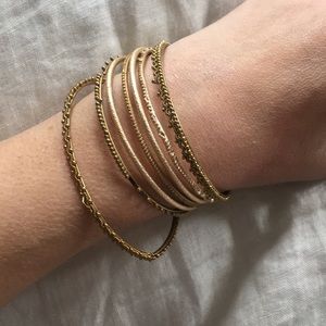 Set of 7 gold colored bangles